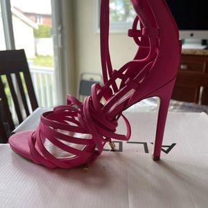 Beautiful pink heels, almost new, lace up.